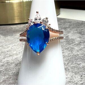 Ring Bomb Party Ring, size 8, NWOT, Blue stone rose gold color band